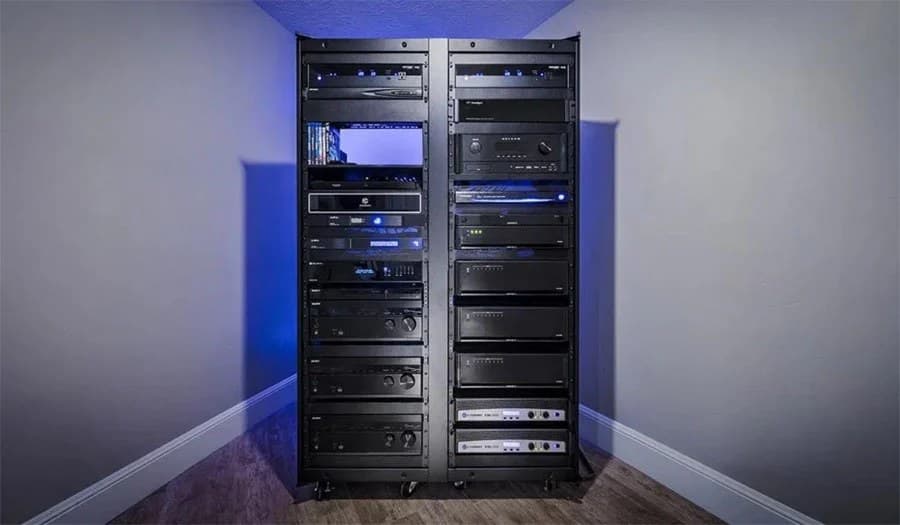Two equipment racks of audio, video and control electronics, neatly dressed